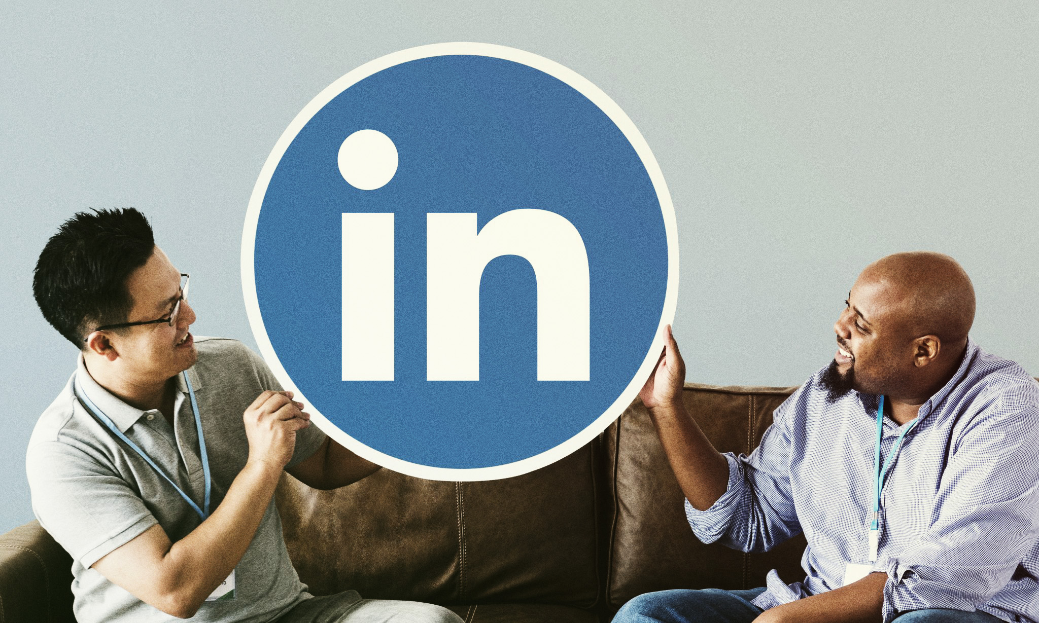 people-holding-linkedin-logo-scaled