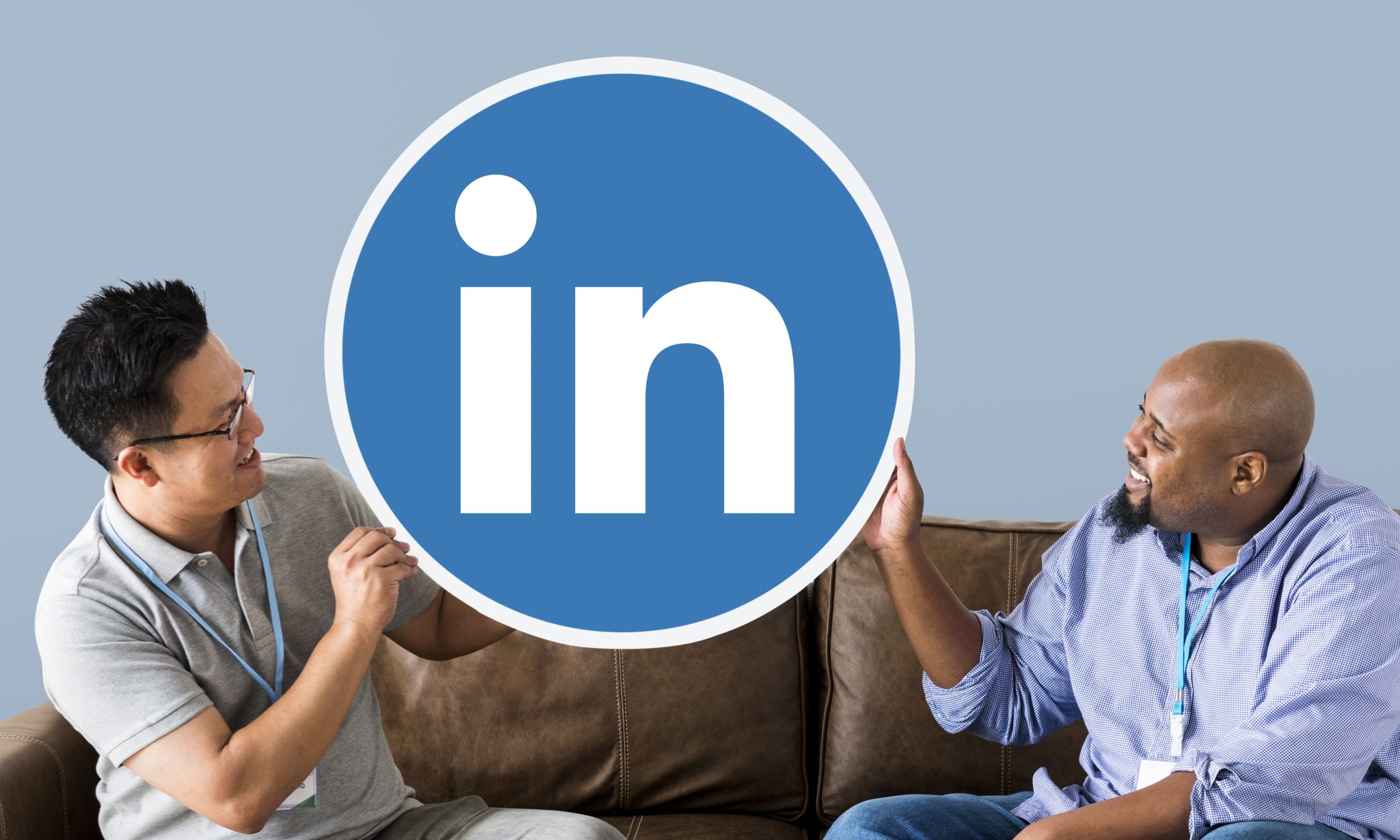 People holding a Linkedin logo